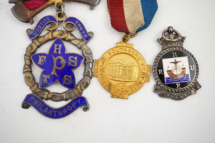 A First World War George V Bravery in the field medal awarded to CPL. R.E. Cox 11th Royal Sussex, a Second World War trio and miniatures, a Masonic medal, etc. (11). Condition - fair to good.